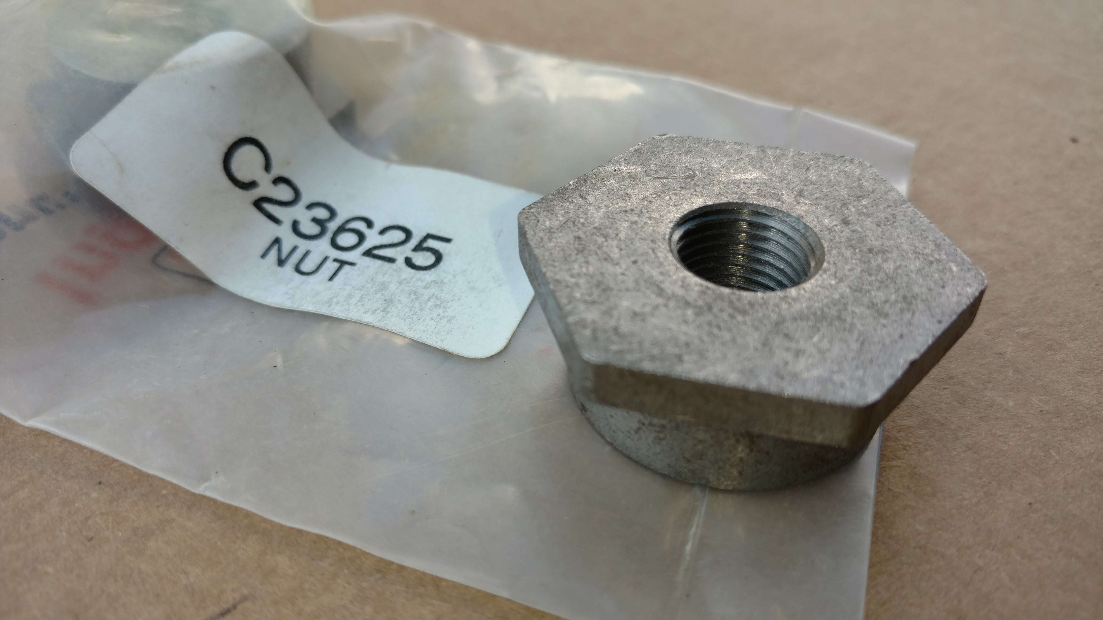 C23625 NUT - CLUTCH ADJ