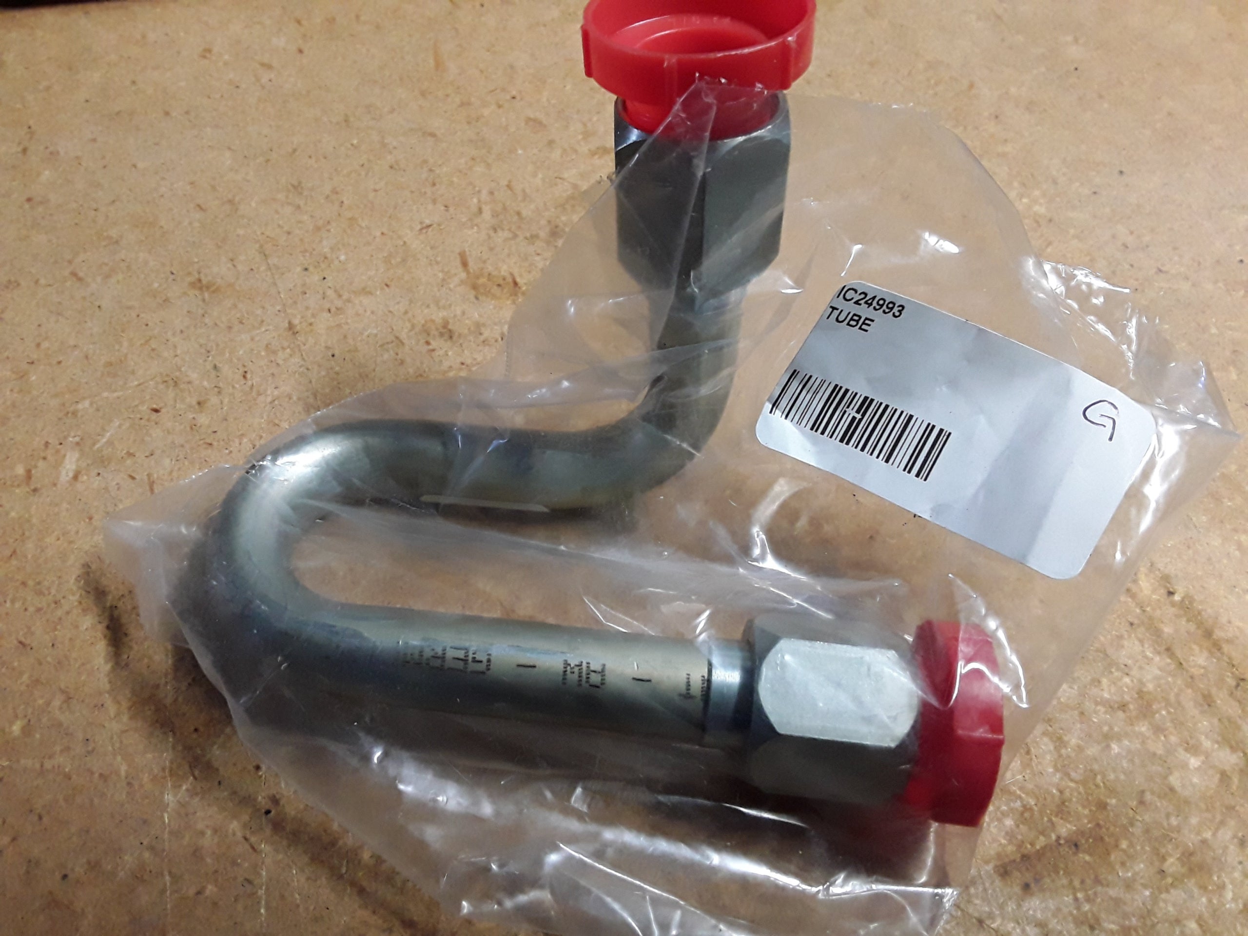 C24993 TUBE-HOLDING VALVE TO TRAVEL