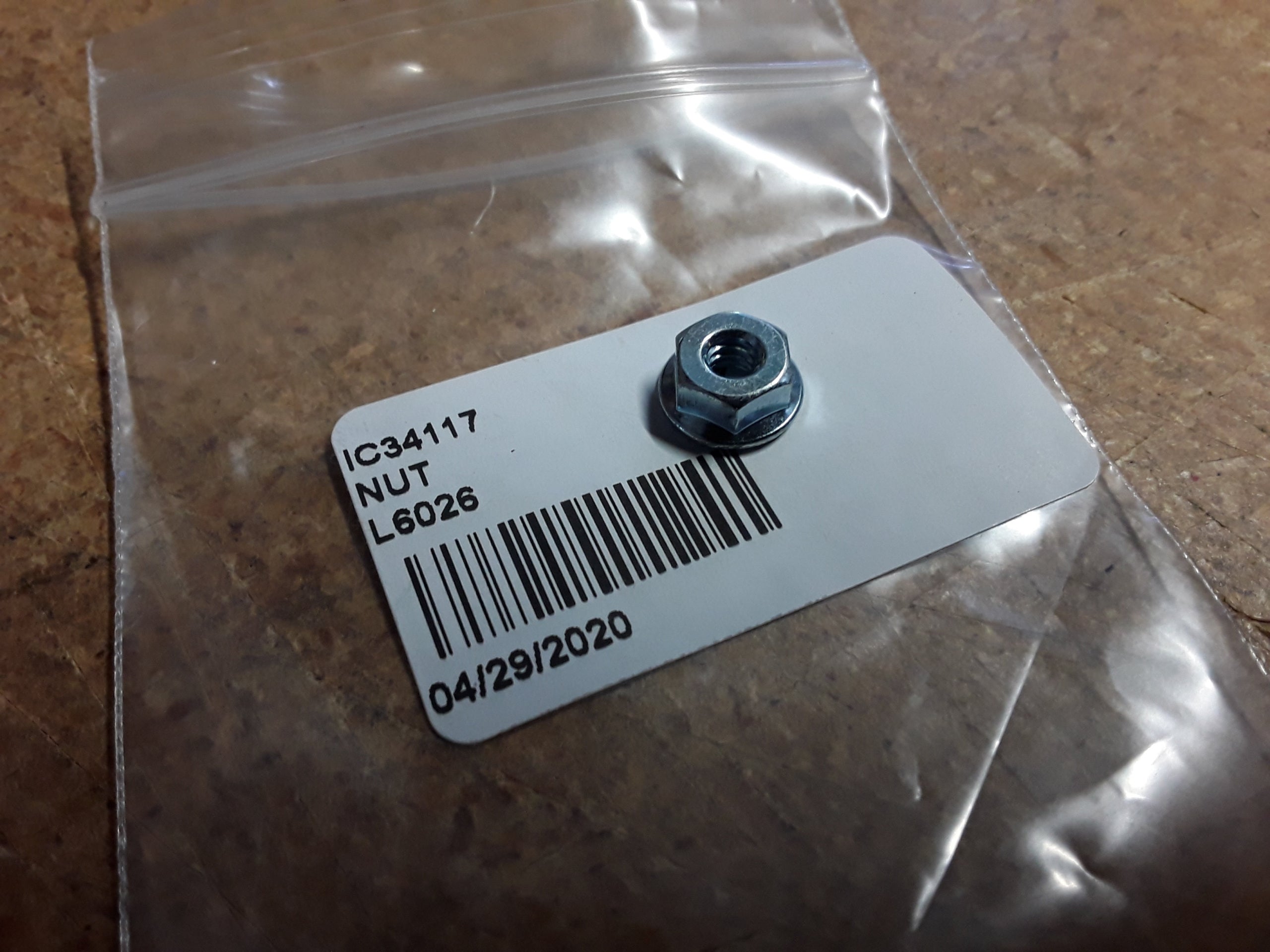 C34117 NUT #10-24 THD HX SERRFL LOCK