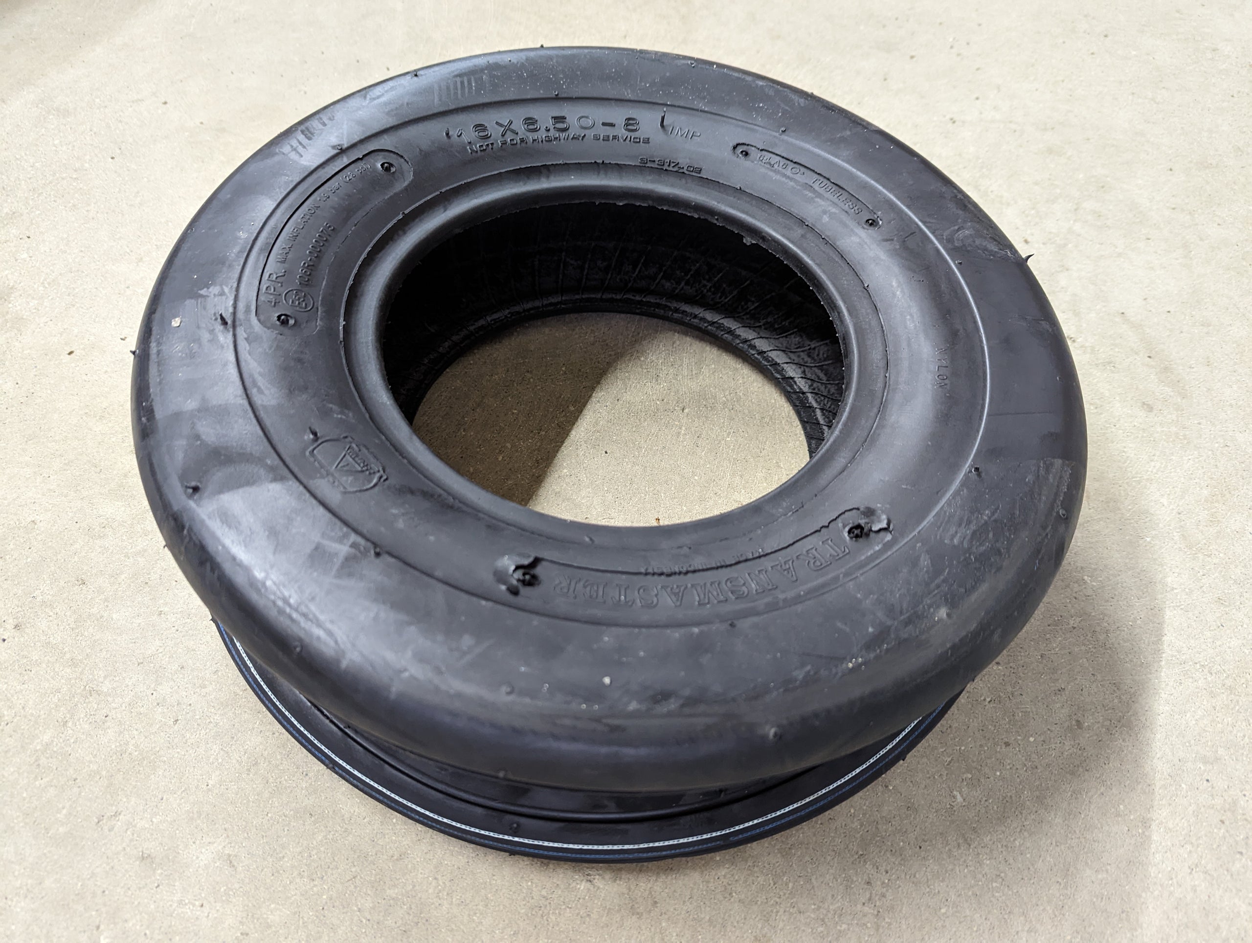C38029 ( replaces G9004015 ) TIRE 16x6.50-8 4ply RIBBED