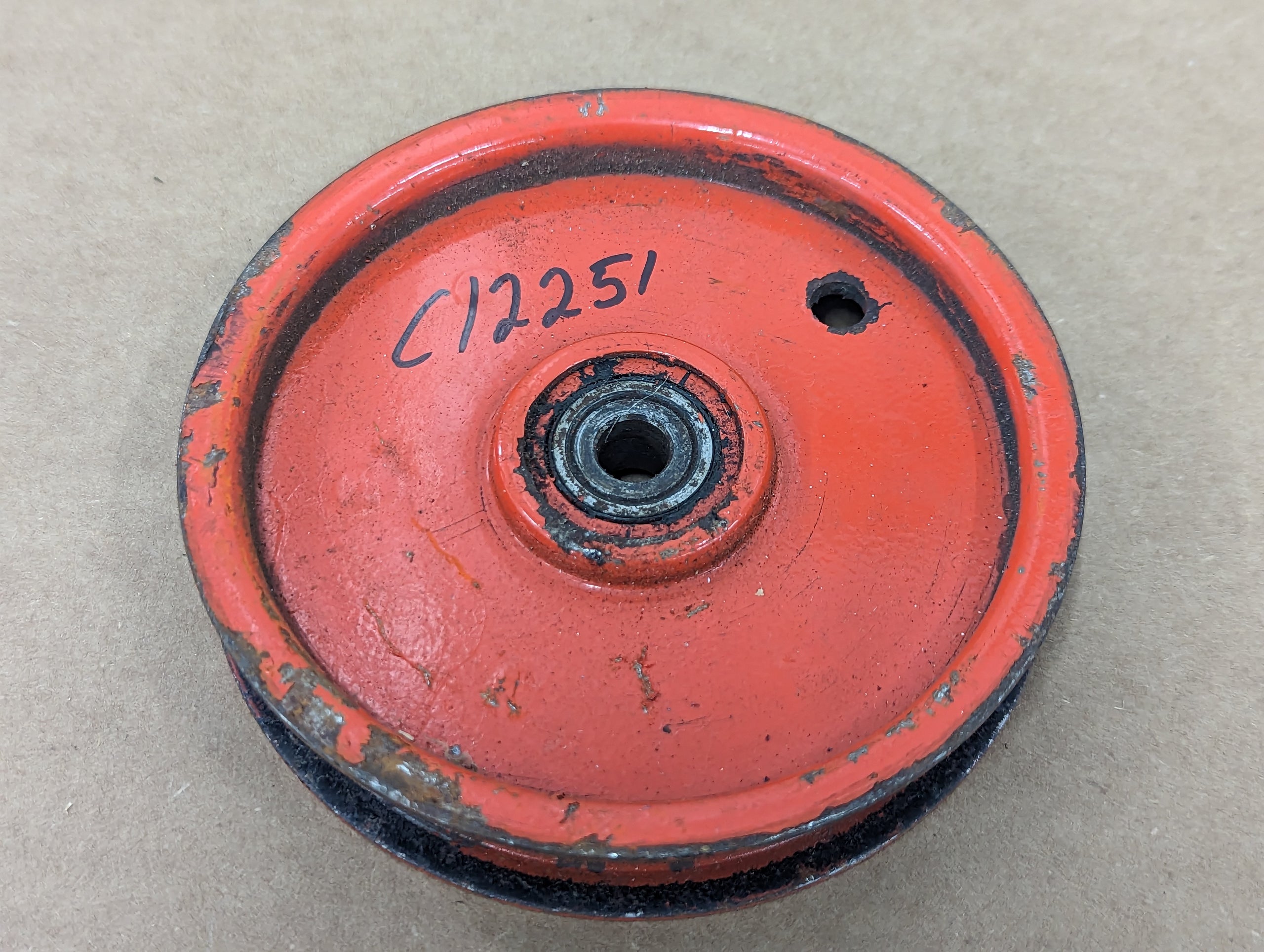 C12251 ( replaces G9021092 ) USED PULLEY-FLAT IDLER 4x.75Wx3/8